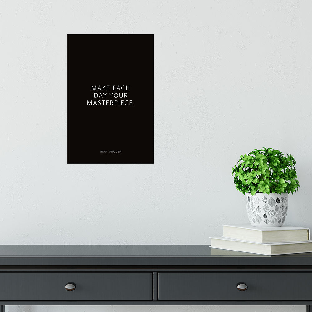 Poster zur Motivation mit dem Spruch Make each day your masterpiece auf schwarzem dezenten Hintergrund